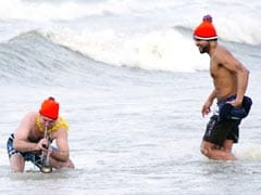 Thousands of Dutch take icy New Year's dip