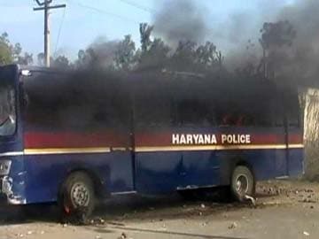 Protesting villagers clash with cops in Hisar, two police buses set on fire 