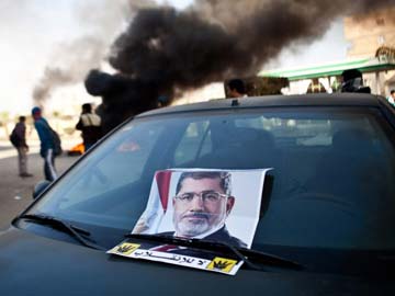 Former Egyptian President Mohamed Morsi's trial delayed to February 1 after court absence