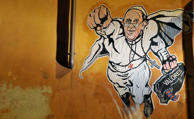 Pope as superman: Vatican tweets graffiti of hero pontiff