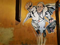 Pope as superman: Vatican tweets graffiti of hero pontiff