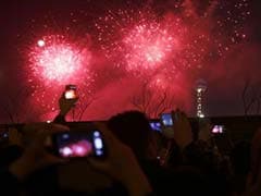 Revelers usher in 2014 with fireworks, festivities