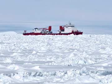 Trapped ships break through Antarctic ice
