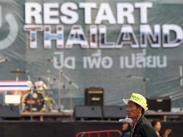 Thai protesters target ministries, threaten bourse