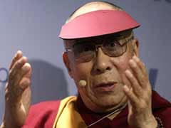 Buddhist faction protests Dalai Lama as he visits US