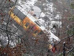 Boulder hurtles off mountain and smashes into French Alps tourist train; two dead
