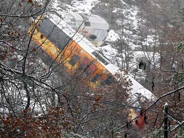Boulder hurtles off mountain and smashes into French Alps tourist train; two dead