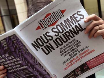 Fury at plan to turn French daily into 'social network'
