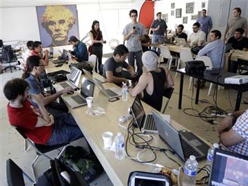 Computer whizzes brainstorm for cash at hackathons 