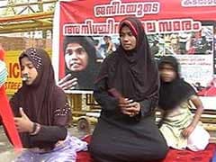 Kerala woman ends demonstration against sand mafia on chief minister assurance