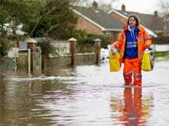 Homes evacuated as floodwaters rise in England