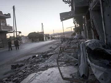Air raids in central Syria kill 26: activists