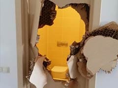 Sochi Olympics: US athlete Johnny Quinn breaks down door after getting locked in toilet