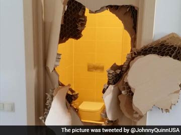 Sochi Olympics: US athlete Johnny Quinn breaks down door after getting locked in toilet