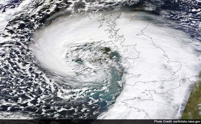 Flood-hit Britain now battered by storms, high winds