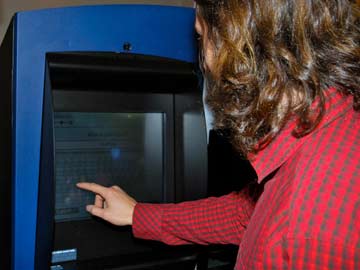 ATMs raise Bitcoin profile, concerns