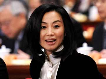 One of China's richest women ousted from top political body