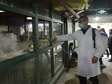 China city closes poultry markets to stop bird flu