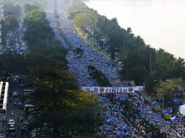 Tens of thousands in Philippine sect's walk for typhoon aid
