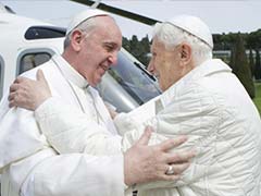 A year after resignation, ex-Pope Benedict has no regrets