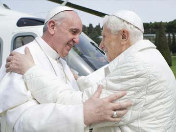 A year after resignation, ex-Pope Benedict has no regrets
