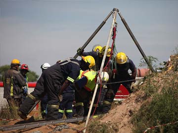 South Africa mine accident: 11 workers pulled out, say rescuers