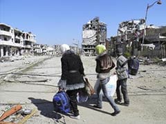 Mortar fire in Syria's Homs ahead of planned UN aid mission