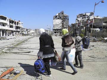 Mortar fire in Syria's Homs ahead of planned UN aid mission