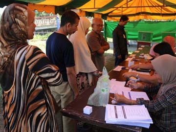 Protesters disrupt voting in tense Thai election