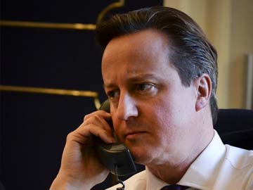 British PM David Cameron laughs off Twitter parodies of Barack Obama call