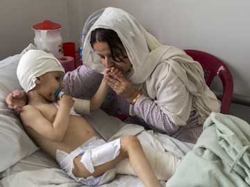 Doctors treating toddler shot by Taliban fear rise in Afghan violence