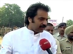 Kuldeep Bishnoi drives a tractor on way to file nomination in Hisar