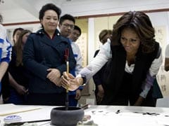 Michelle Obama pushes soft diplomacy on visit to China