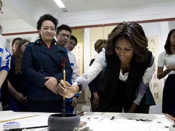 Michelle Obama pushes soft diplomacy on visit to China