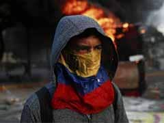 Protests and talks widen rifts in Venezuela opposition