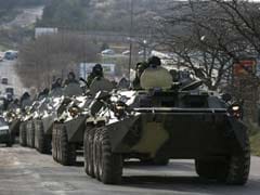 Russia holds war games near Ukraine; Angela Merkel warns of catastrophe