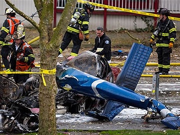 Investigators examine fatal helicopter crash scene in Seattle