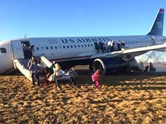 US Airways plane blows tire on takeoff, passengers evacuated