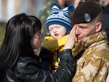 Ukraine troops exit Crimea as defence chief steps down
