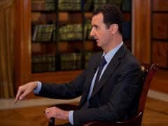 Syria's Bashar al-Assad hails Russia's takeover of Crimea