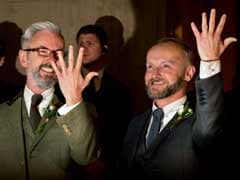 UK couples say 'I do' as gay marriage becomes legal