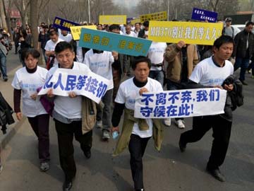 Chinese MH370 relatives demand Beijing probe