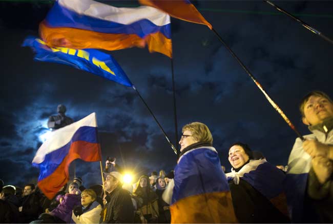 Crimea votes to secede from Ukraine as Russian troops keep watch