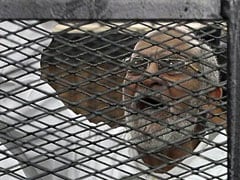 Egypt puts top Brotherhood leader, 682 others on trial