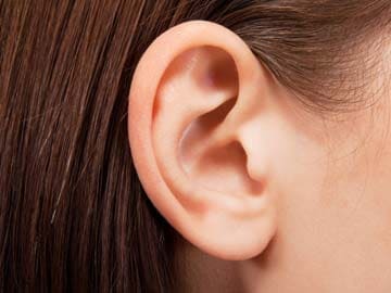 Japan researchers testing tiny ear computer