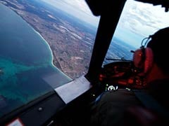 Planes, ships chase new leads in search for Malaysian jet