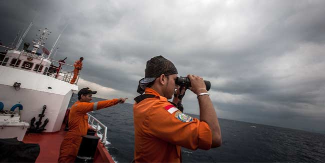 Malaysian officials, saying missing jet was diverted, open criminal inquiry