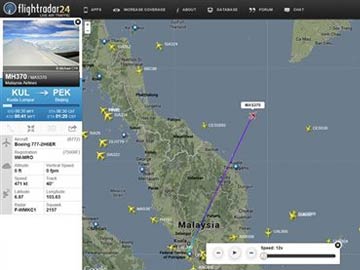 Vietnam spots oil slicks in hunt for missing Malaysian jetliner