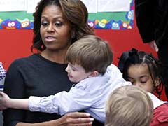 In China, Michelle Obama to stay firmly in 'mom in chief' mode