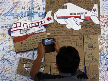 Families of missing MH370 shifted for Malaysian Grand Prix